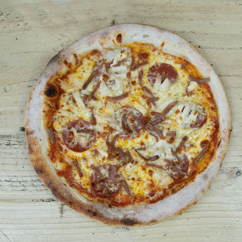 Photo of Meat Feast Pizza: Ham, pepperoni and chicken pizza. Choice of garlic, tomato, salsa, BBQ or piri piri base.